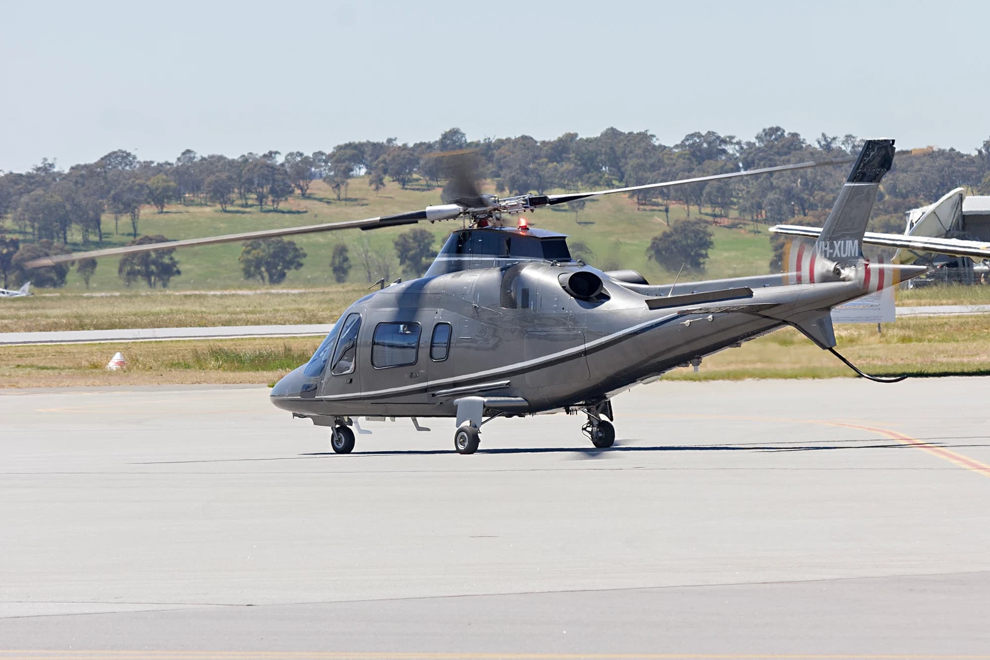 Agusta A109S VH-XUM taxiing at Wagga Wagga Airport